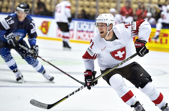 epa06745575 Enzo Corvi of Switzerland during the IIHF World Championship quarter finals match between Finland and Switzerland at Jyske Bank Boxen in Herning, Denmark, 17 May 2018. EPA/HENNING BAGGER D ...