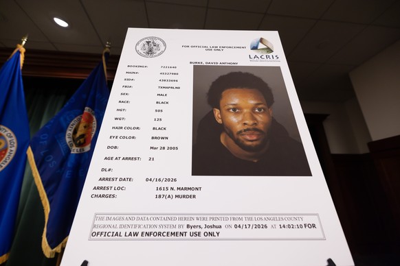 epa12903155 A mugshot picture of singer David Anthony Burke (D4vd) is presented at a press conference held by Los Angeles District Attorney and LAPD law enforcement officials, as charges were filed ag ...
