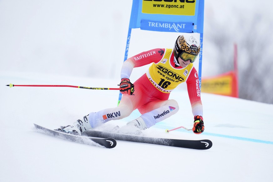 Wendy Holdener of Switzerland speeds down the course as she races in the women&#039;s World Cup giant slalom in Mont Tremblant, Quebec, Sunday, Dec. 3, 2023.(Sean Kilpatrick /The Canadian Press via AP ...