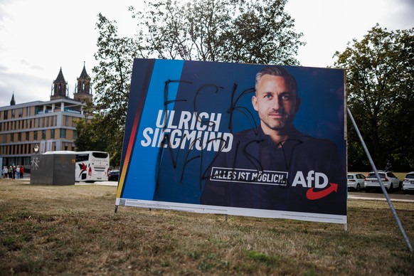 epa13177556 A campaign poster of Alternative for Germany party (AfD) shows regional top candidate Ulrich Siegmund and a graffiti, that reads 'FCK Nazis!' in Magdeburg, Germany, 18 August 202 ...