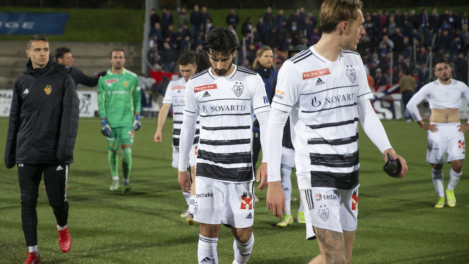 Basel&#039;s players look disappointed after losing against Etoile Carouge team, during the Swiss Cup Round of 16 between Etoile Carouge FC and FC Basel, at the Stade de la Fontenette, in Carouge, Swi ...