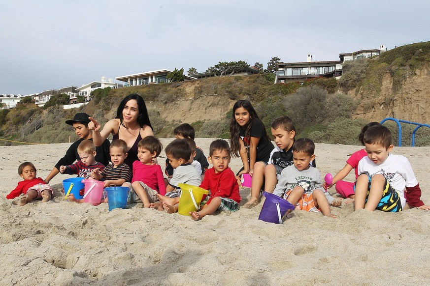 **EXCLUSIVE** Nadya Octomom Suleman is spotted taking her octuplets to the beach for a day of fun 71840, LOS ANGELES CALIFORNIA - Tuesday January 17, 2012. **EXCLUSIVE** Nadya Octomom Suleman takes he ...