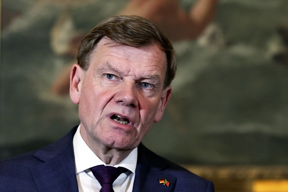 epa12137344 German Foreign Affairs Minister Johann Wadephul speaks during a joint press conference with his Portuguese counterpart, Paulo Rangel (not pictured) after a meeting at the Ministry of Forei ...