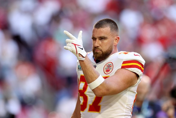 epa10464075 Kansas City Chiefs tight end Travis Kelce on the field prior to the start of Super Bowl LVII between the AFC champion Kansas City Chiefs and the NFC champion Philadelphia Eagles at State F ...