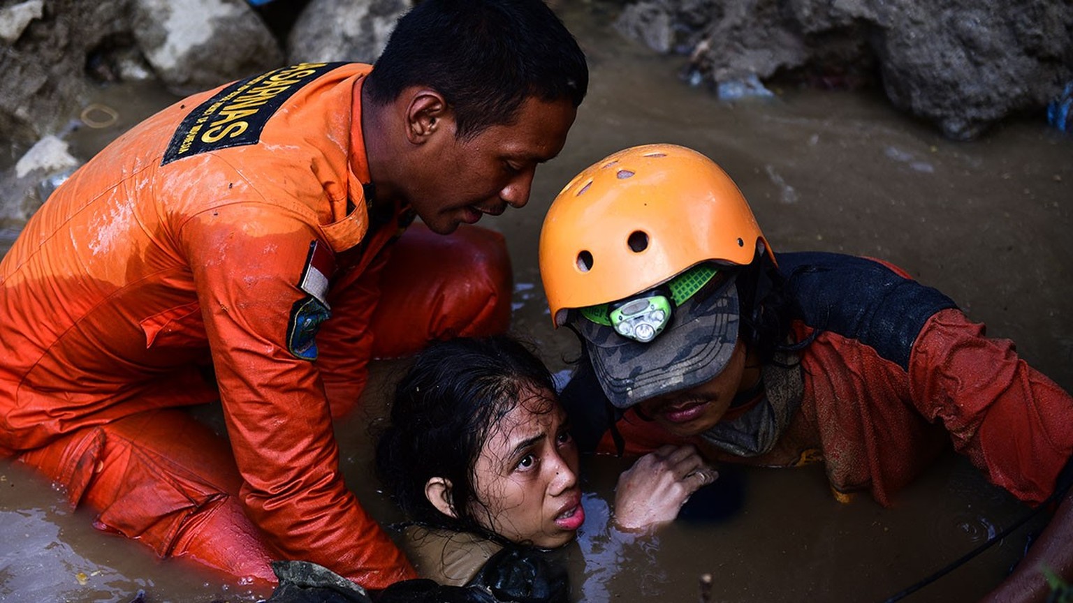 On 30 September 2018 in Indonesia, Nurul Istikhoroh (15) is evacuated by the Basarnas team at the Balaroa National Park in West Palu, Central Sulawesi, after almost 48 hours of being trapped in the ru ...