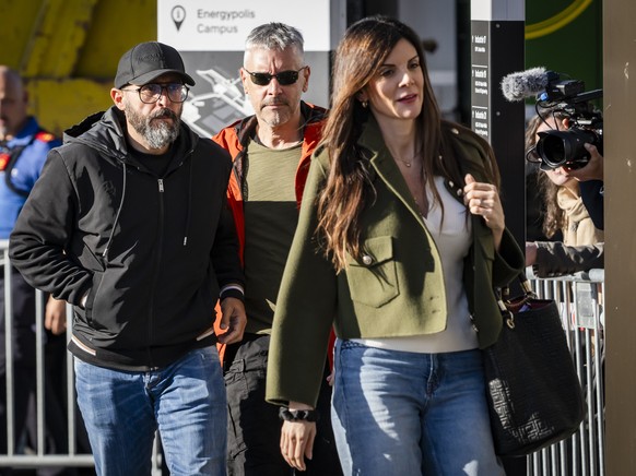 Jacques and Jessica Moretti, owners of '"Le Constellation'", where 41 people died due to a fire during New Year celebrations, arrive surrounded by police officers for a hearing wit ...