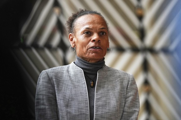 Patricia Danzi, Swiss development official and former athlete, speaks with the media as she arrives for a meeting at the 9th international conference in support of Syria at the European Council buildi ...