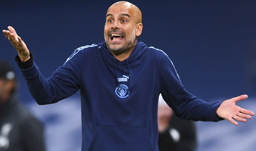 epa08523890 Manchester City Manager Pep Guardiola during the English Premier League match between Manchester City and Liverpool in Manchester, Britain, 02 July 2020. EPA/Laurence Griffiths/NMC/Pool ED ...