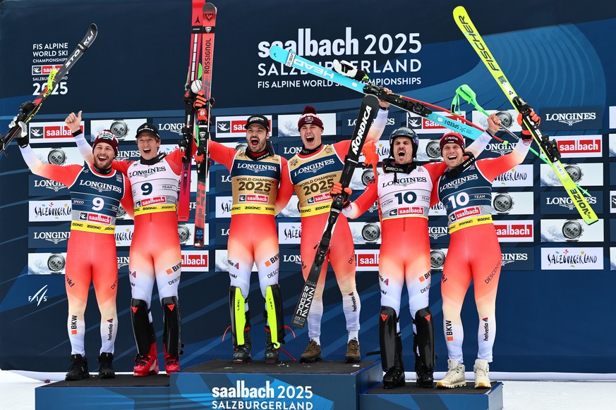 epaselect epa11890717 (L-R) Silver medalists Alexis Monney and Tanguy Nef of Switzerland, Gold medalists Loic Meillard and Franjo von Allmen of Switzerland, Bronze medalists Marc Rochat and Stefan Rog ...