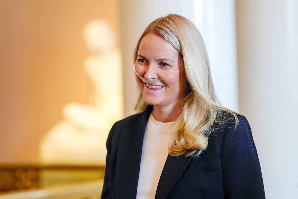FILE - Norway's Crown Princess Mette Marit smiles during a reception for Norwegian athletes who competed in the Milan Cortina Paralympics, in Oslo, Friday, April 10, 2026. (Lise Åserud/NTB Scanpi ...