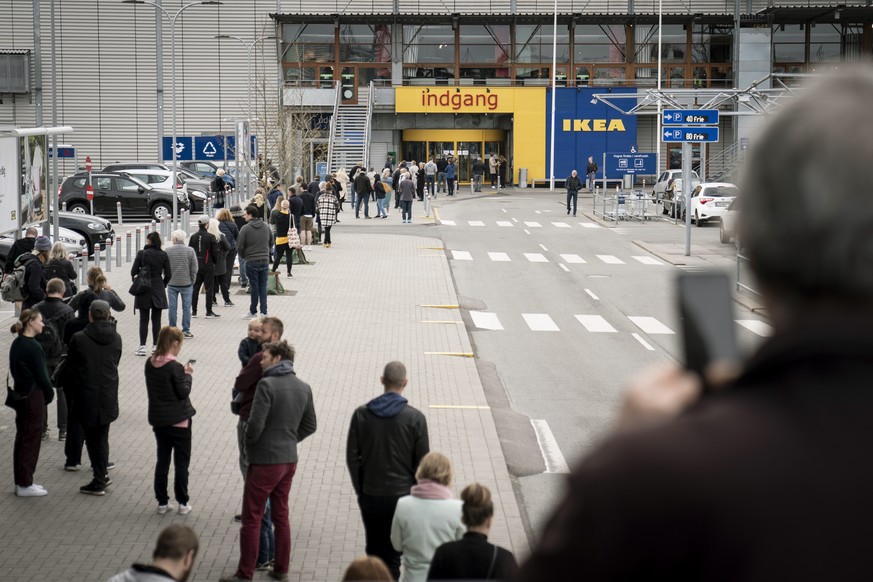 People queue as Ikea reopened in Gentofte, Denmark, Monday, April 27, 2020, amid the coronavirus outbreak. (Niels Christian Vilmann/Ritzau Scanpix via AP)