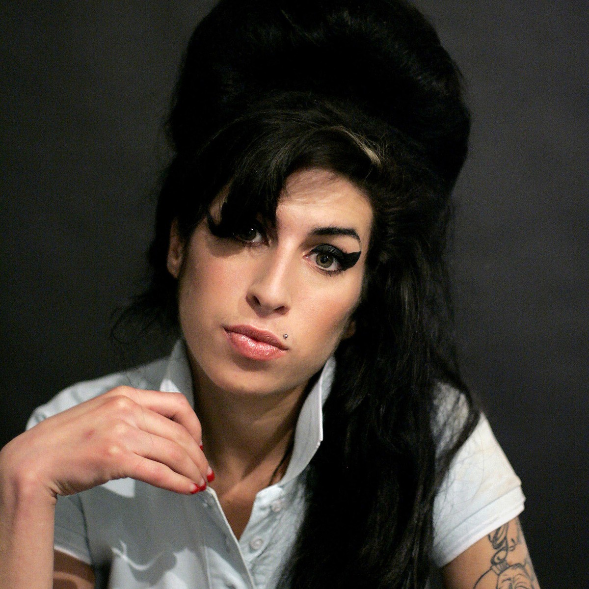 FILE - In this Friday Feb. 16, 2007 file photo British singer Amy Winehouse poses for photographs after being interviewed by the Associated Press at a studio in north London. Universal Music Group ...