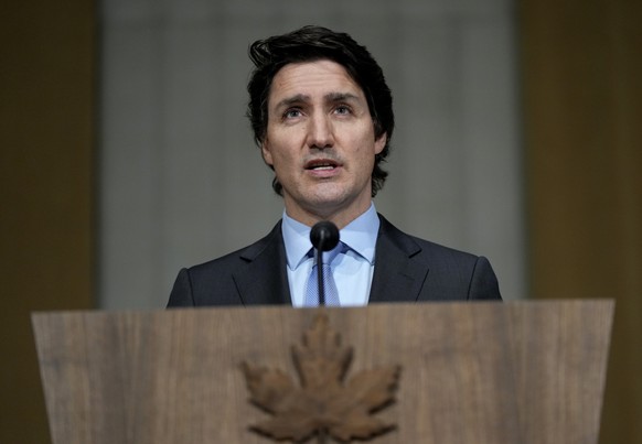 Prime Minister Justin Trudeau speaks on the situation in Ukraine, in Ottawa, on Tuesday, Feb. 22, 2022. Trudeau says Canada is sending hundreds more troops to eastern Europe and imposing new sanctions ...