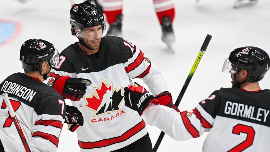 Russian ice hockey, iHockey's European Tour Russia - Canada 6722082 12/15/2021 Canadians Matt Robinson, Corban Knight and Brandon Gormley celebrate a goal during the European Hockey Tour's Channel 1 match between ...