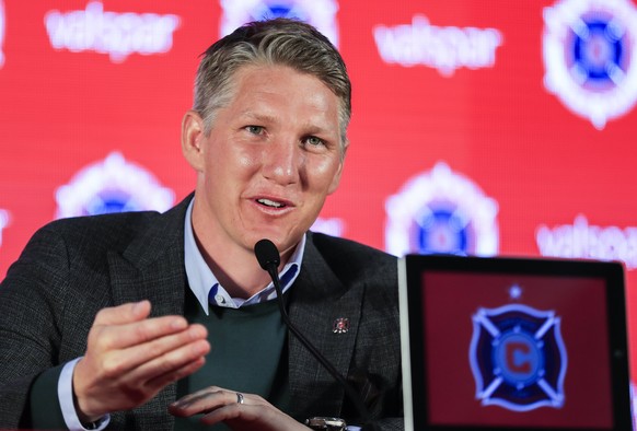 epa05877992 German soccer player Bastian Schweinsteiger responds to a question as he is introduced at The PrivateBank Fire Pitch in Chicago, Illinois, USA, 29 March 2017. Schweinsteiger has joined the ...