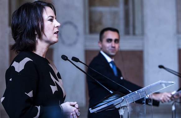 epa09677266 German Foreign Minister Annalena Baerbock attends a joint press conference with her Italian counterpart Di Maio following their meeting, at Villa Madama in Rome, Italy, 10 January 2022. EP ...