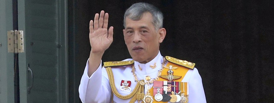 Thailand&#039;s King Maha Vajiralongkorn greets an audience from the balcony of Suddhaisavarya Prasad Hall in the Grand Palace during the coronation ceremony Monday, May 6, 2019, in Bangkok, Thailand. ...