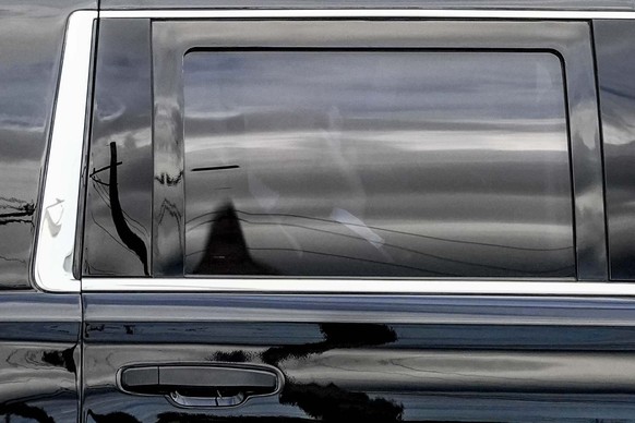 Former President Trump waves to supporters after arriving to the Milwaukee Mitchell International Airport ahead of the 2024 Republican National Convention, Sunday, July 14, 2024, in Milwaukee. (AP Pho ...
