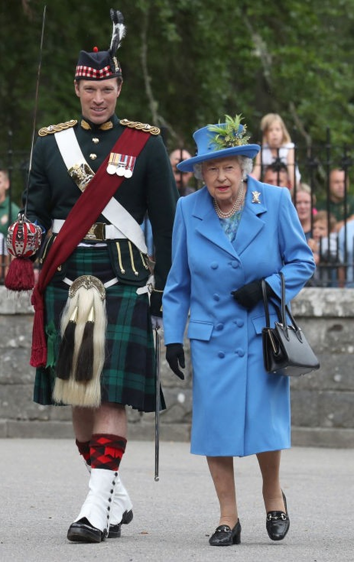 Queen Elizabeth II, with Officer Commanding Major Johnny Thompson, inspects Balaclava Company, 5 Battalion The Royal Regiment of Scotland at the gates at Balmoral, as she takes up summer residence at  ...