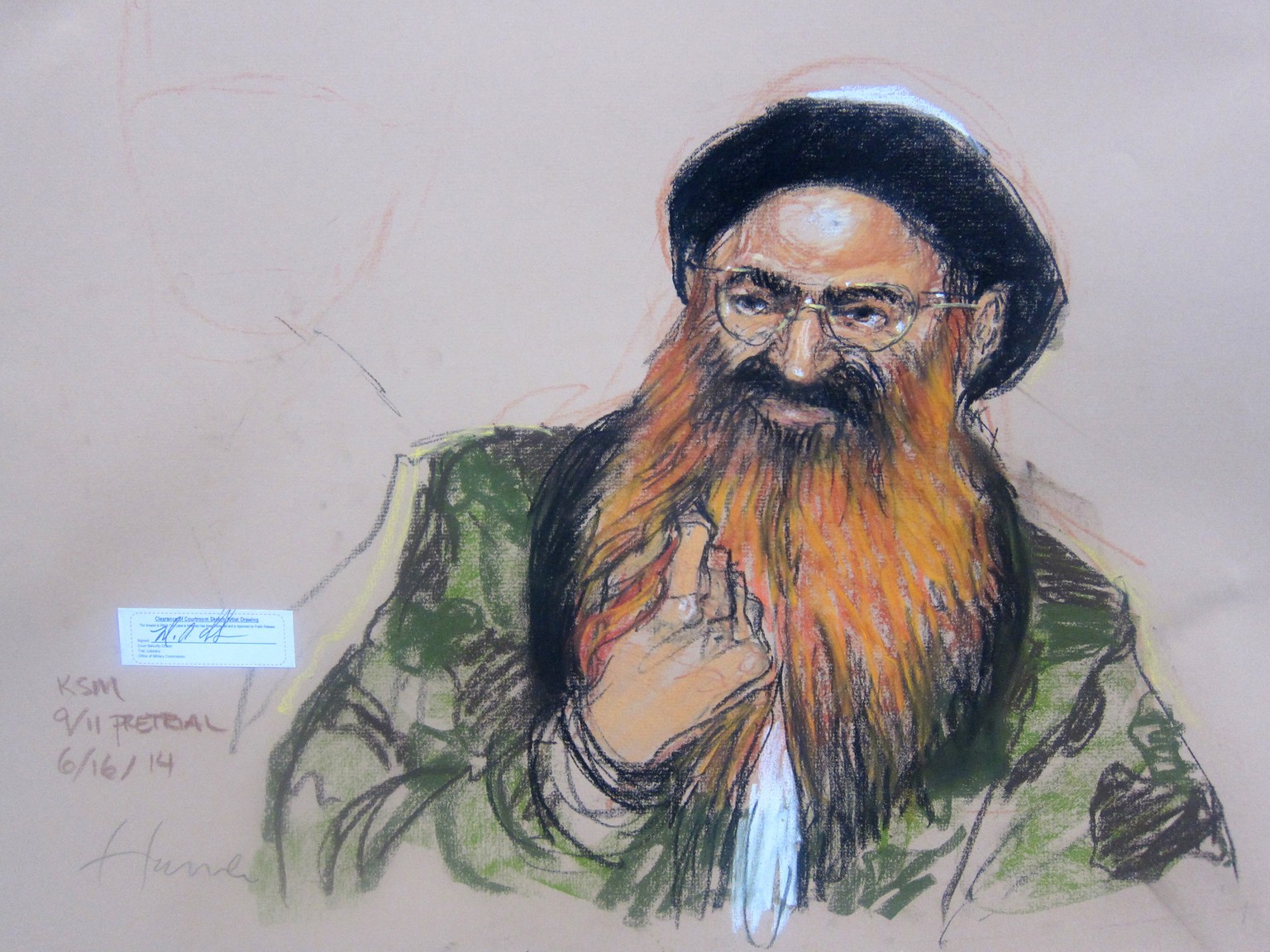 Self-proclaimed 9/11 mastermind Khalid Sheikh Mohammad attends pretrial hearings in Guantanamo Bay, Cuba, June 16, 2014 in this Pentagon-approved sketch by court artist Janet Hamlin. Attorneys for fiv ...