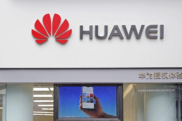 FILE - In this March 7, 2019 file photo, a logo of Huawei is displayed at a shop in Shenzhen, China&#039;s Guangdong province. President Donald Trump issued an executive order Wednesday, May 15, 2019, ...