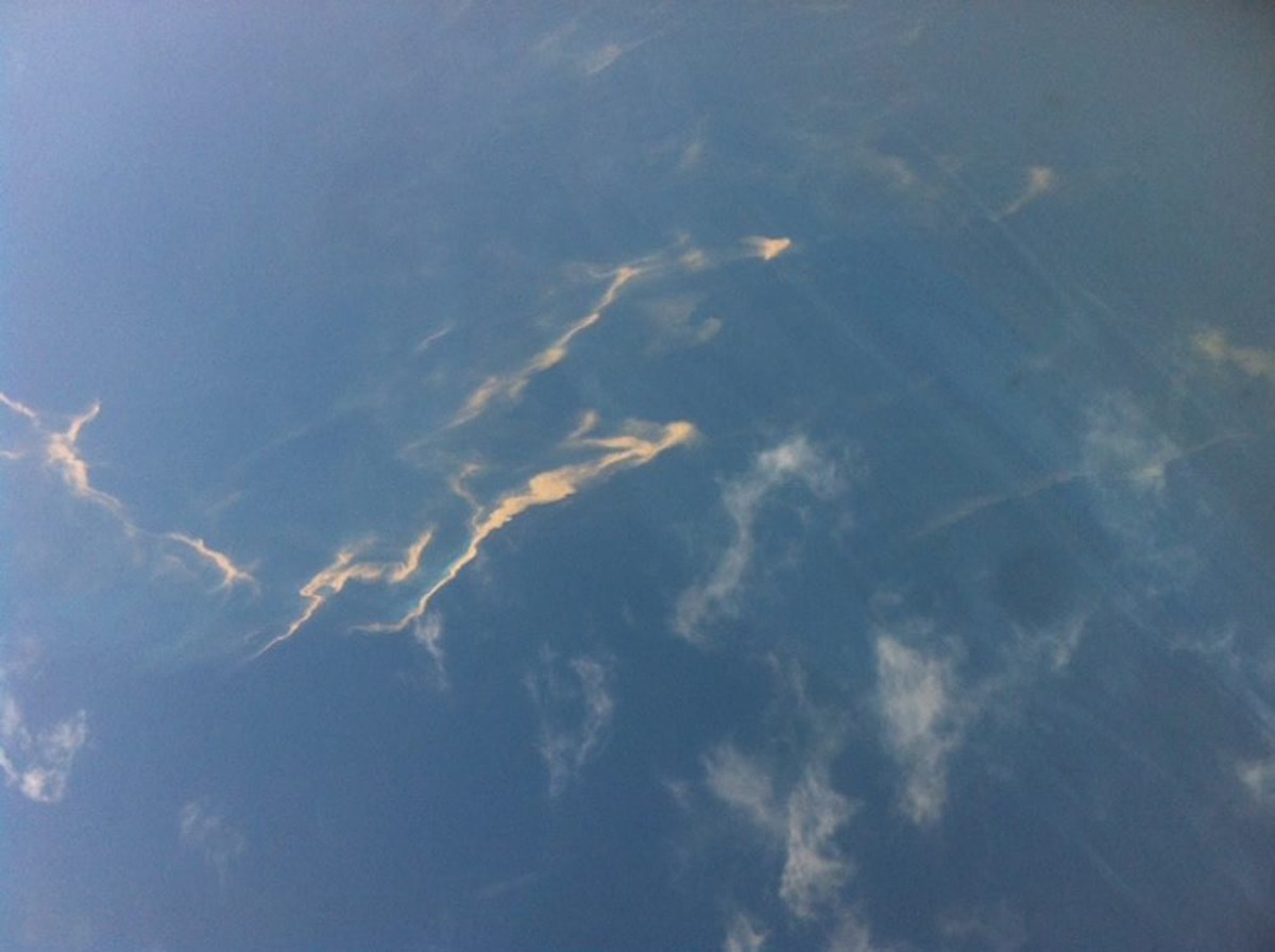 epa04115540 A handout picture provided by Tienphong.vn shows what is believed to be an oil slick stretching a length of about 15-20 km in the sea off the Vietnamese coast, 08 March 2014. The slick is  ...