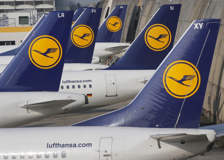 FILE - In this April 2, 2014 file picture Lufthansa aircraft are parked as Lufthansa pilots went on a three-days-strike in Frankfurt, Germany. Lufthansa says Thursday, Dec. 15, 2016, it will buy the r ...