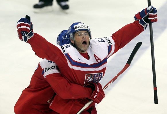 Jaromir Jagr (R) of the Czech Republic celebrates with his teammate Michal Jordan after scoring a goal against Finland during their Ice Hockey World Championship quarterfinal game at the O2 arena in P ...