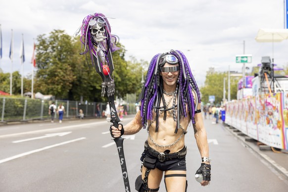 A dressed up participant during the 30th Street Parade in the city center of Zurich, Switzerland, Saturday, August 12, 2023. The annual dance music event Street Parade runs this year under the claim & ...