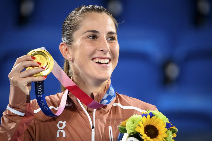 Gold medal winner Belinda Bencic of Switzerland celebrates with her medal during the victory ceremony after winning the games against Marketa Vondrousova of Czech Republic during the women&#039;s sing ...