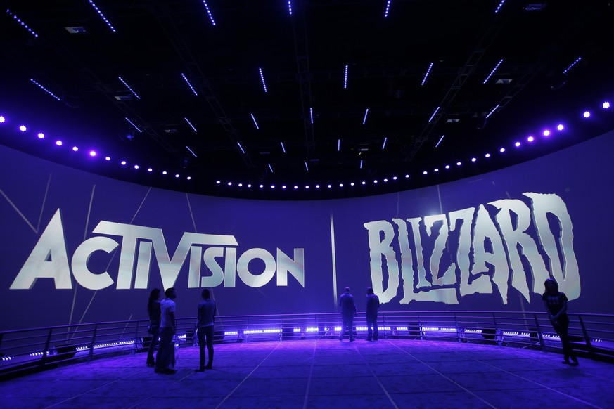 FILE - The Activision Blizzard Booth during the Electronic Entertainment Expo in Los Angeles, June 13, 2013. British regulators have blocked Microsoft&#039;s $69 billion deal to buy videogame maker Ac ...
