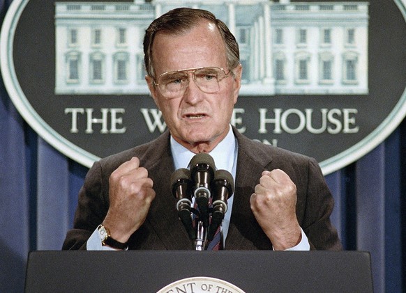FILE - In this June 5, 1989 file photo, U.S. President George H.W. Bush holds a news conference at the White House in Washington where he condemned the Chinese crackdown on pro-democracy demonstrators ...