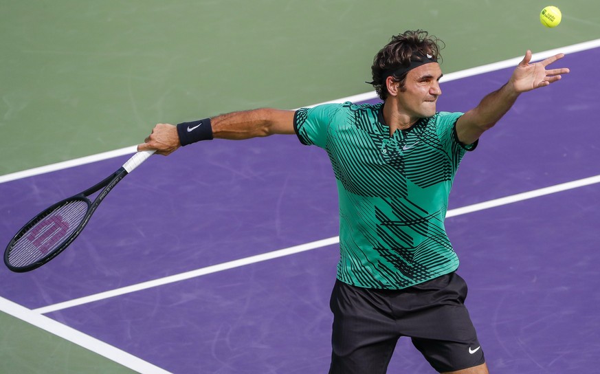 epa05879775 Roger Federer of Switzerland in action against Tomas Berdych of the Czech Republic during a quarterfinal round match at the Miami Open tennis tournament on Key Biscayne, Miami, Florida, US ...