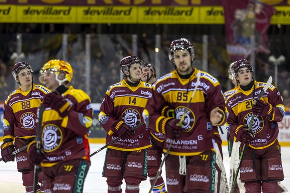 Geneve-Servette&#039;s players look disappointed after losing against the team Bern, during a National League regular season game of the Swiss Championship between Geneve-Servette HC, GSHC, and SC Ber ...