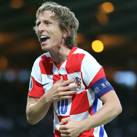 epa09294358 Luka Modric of Croatia celebrates after scoring his team's second goal during the UEFA EURO 2020 group D preliminary round soccer match between Croatia and Scotland in Glasgow, Britai ...