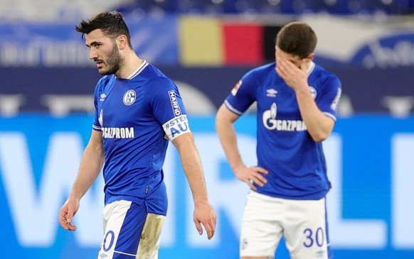 epa09086848 Schalke&#039;s Sead Kolasinac (L) reacts after losing the German Bundesliga soccer match between FC Schalke 04 and Borussia Moenchengladbach in Gelsenkirchen, Germany, 20 March 2021. EPA/F ...