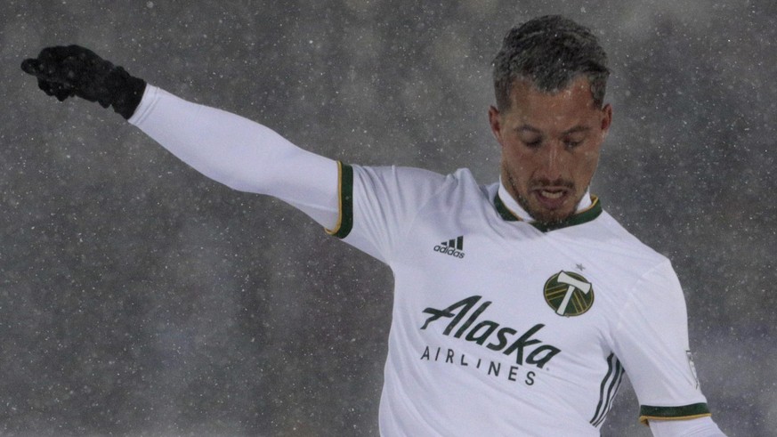 Portland Timbers midfielder Sebastian Blanco (10) shoots on goal against the Colorado Rapids in the second half of an MLS soccer game Saturday, March. 2, 2019 in Commerce City, Colo. Portland and Colo ...