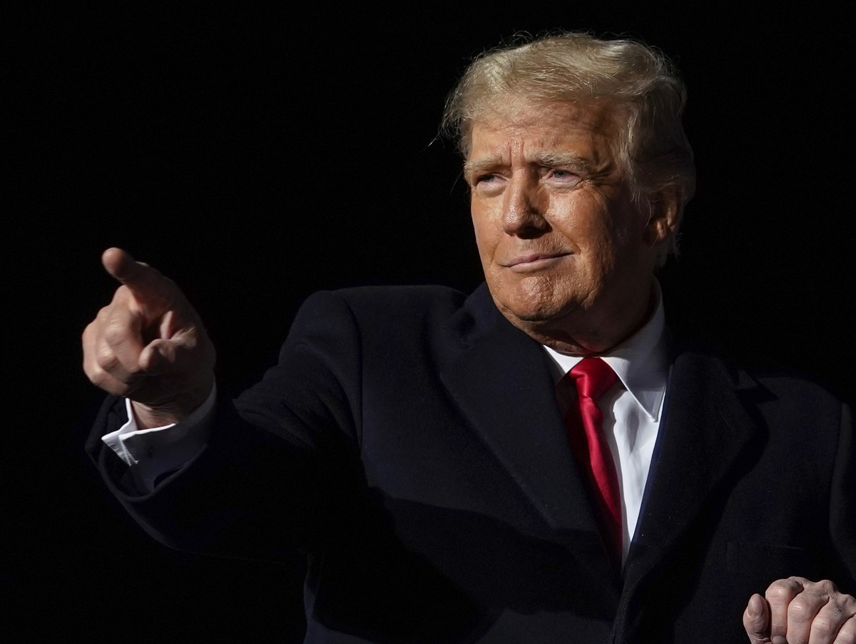 Former President Donald Trump dances after he finished speaking at a campaign rally in support of the campaign of Ohio Senate candidate JD Vance at Wright Bros. Aero Inc. at Dayton International Airpo ...