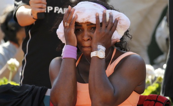 Serena Williams of the U.S. sits during a break in her women&#039;s semi-final match against Timea Bacsinszky of Switzerland at the French Open tennis tournament at the Roland Garros stadium in Paris, ...