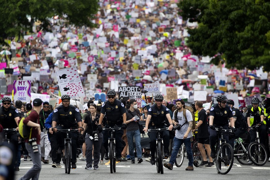 epaselect epa09947656 Abortion rights supporters march from the Washington Monument to the Supreme Court in Washington, DC, USA, 14 May 2022. Protests and rallies continue all over the US in reaction  ...