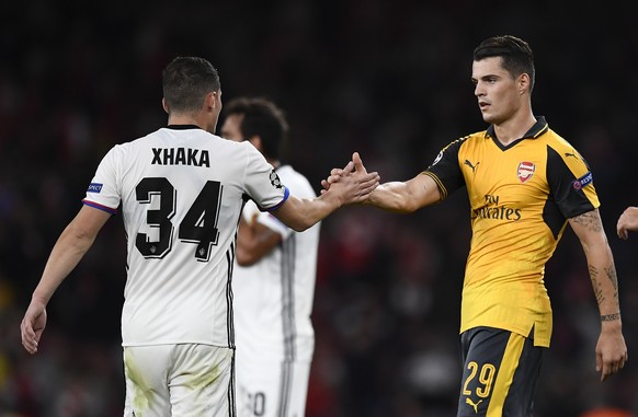 Britain Soccer Football - Arsenal v FC Basel - UEFA Champions League Group Stage - Group A - Emirates Stadium, London, England - 28/9/16
FC Basel's Taulant Xhaka with his Brother Granit Xhaka of Arsenal after the match
Reuters / Dylan Martinez
Livepic
EDITORIAL USE ONLY.