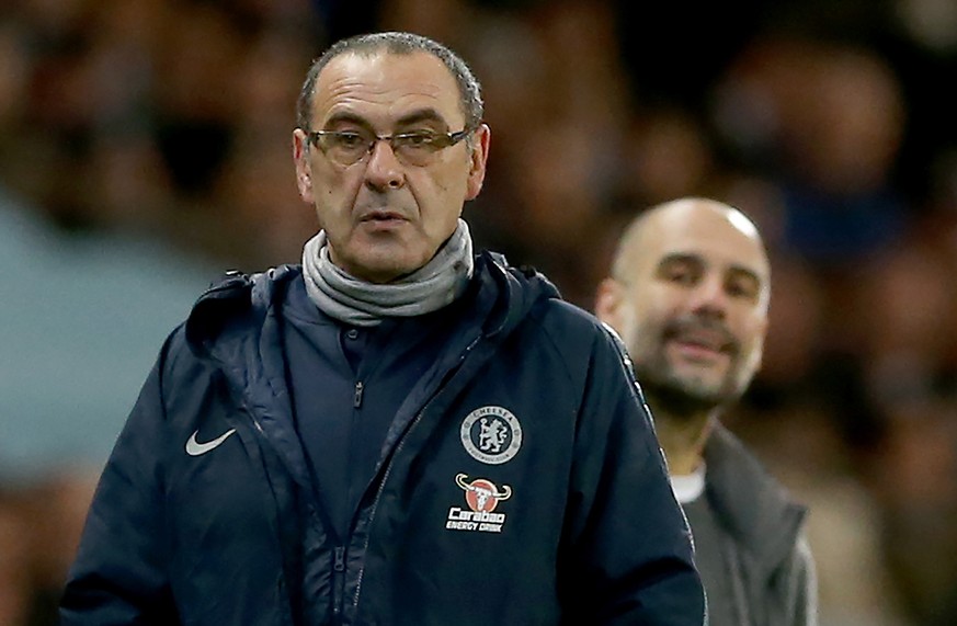 epa07359772 Chelsea&#039;s manager Maurizio Sarri (L) and Manchester City&#039;s manager Pep Guardiola during the English premier league soccer match between Manchester City and Chelsea at the Etihad  ...