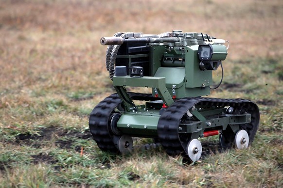Ukrainian Defence Intelligence shows Lehit And Ravlyk UGVs A weapon is mounted on the Lehit ground robotic system, developed by specialists of the International Legion under the Defence Intelligence o ...