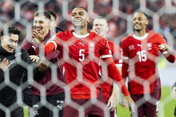 Switzerland&#039;s defender Manuel Akanji celebrate their victory after defeating the Sweden, during the FIFA 2026 World Cup Group B qualifying soccer match between Switzerland and Sweden, at the Stad ...