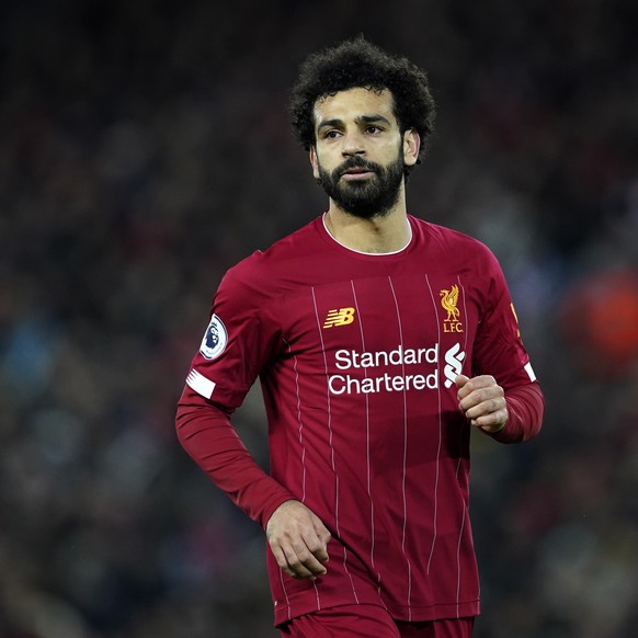 Liverpool's Mohamed Salah runs during the English Premier League soccer match between Liverpool and Sheffield United at Anfield Stadium, Liverpool, England, Thursday, Jan. 2, 2020. (AP Photo/Jon ...