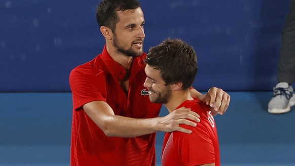 epa09379840 Mate Pavic and Nikola Mektic of Croatia celebrate gold medal after winning the Men&#039;s Doubles Gold Medal match, Tennis events of the Tokyo 2020 Olympic Games at the Ariake Coliseum in  ...