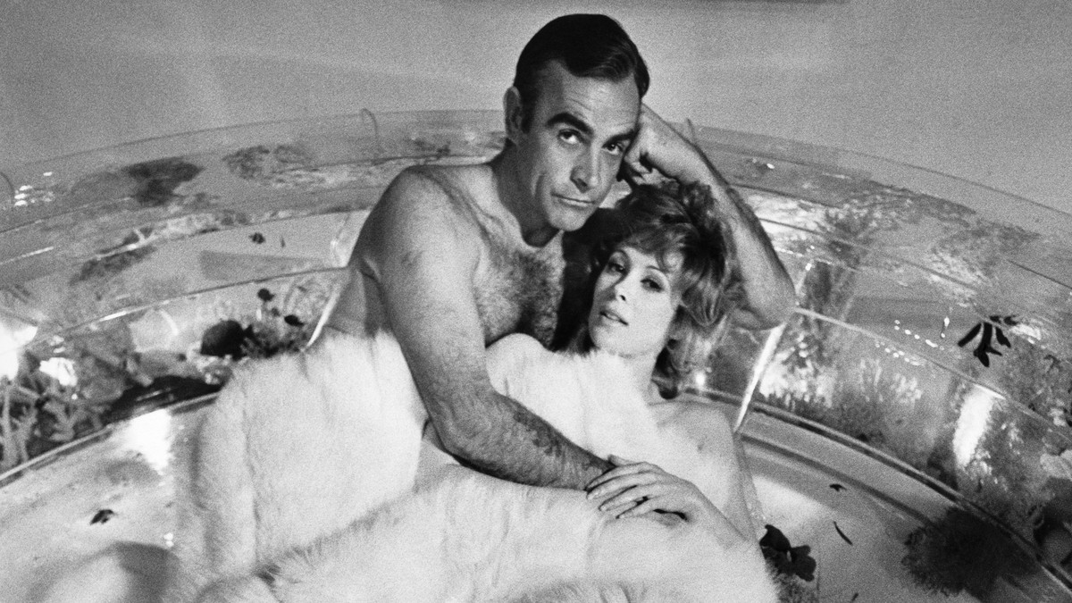 British actor Sean Connery as 007 secret agent James Bond in the bath with Bond girl Tiffany Case, played by American actress Jill St John, in the 1971 film Diamonds Are Forever. (Photo by Terry O ...