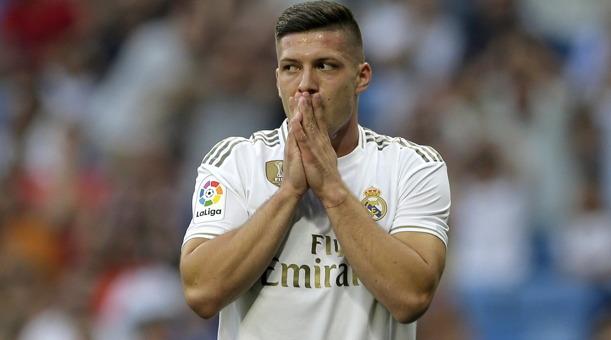 Real Madrid's Luka Jovic gestures during the Spanish La Liga soccer match between Real Madrid and Valladolid at the Santiago Bernabeu stadium in Madrid, Spain, Saturday, Aug. 24, 2019. (AP Photo/ ...