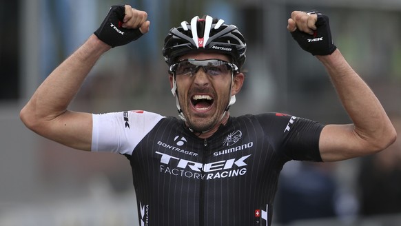 Trek Factory Racing team rider Fabian Cancellara of Switzerland celebrates winning the 98th Ronde van Vlaanderen (Tour of Flanders) Classic cycling race in Oudenaarde April 6, 2014. REUTERS/Francois L ...