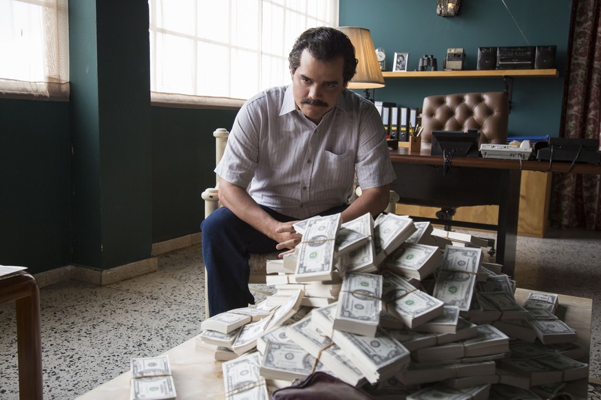 This image released by Netflix shows Wagner Moura as Pablo Escobar in the Netflix Original Series &quot;Narcos.&quot; The series was nominated for a Golden Globe award for best television drama on Thu ...